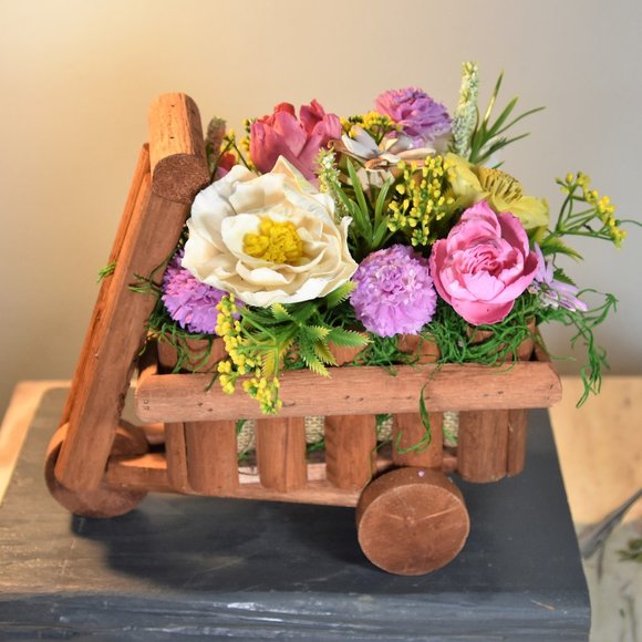 Cheerful garden arrangement of airbrushed Sola wood flowers in a garden cart - Picture 9 of 15